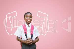 Happy student boy with fists graphic standing against pink background