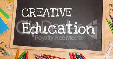 Creative education text on blackboard