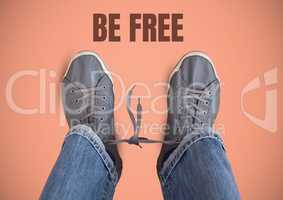 Be free text and Grey shoes on feet with pink background
