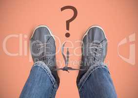Question mark and Grey shoes on feet with pink background