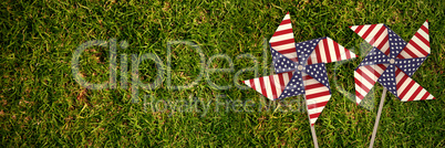 Composite image of 3d image composite of pinwheel with american flag pattern