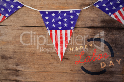 Composite image of digital composite image of happy labor day text with blue outline