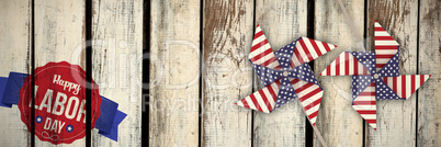 Composite image of happy labor day text in banner