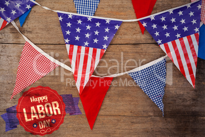 Composite image of happy labor day text in banner