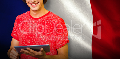 Composite image of smiling student with tablet