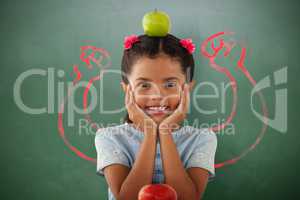 Composite image of girl with granny smith apple on head