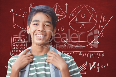 Composite image of portrait of happy boy with backpack