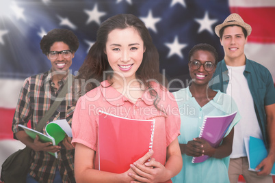 Composite image of stylish students smiling at camera together