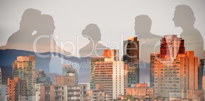 Composite image of silhouettes sitting