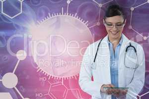Composite image of smiling female doctor using digital tablet