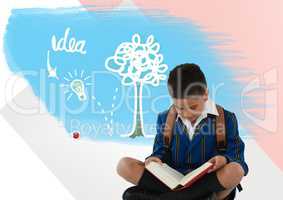 Schoolboy reading with colorful idea graphics