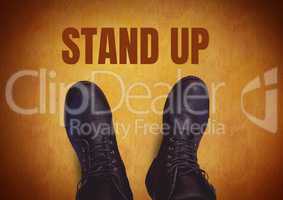 Stand up  text  and black shoes on feet with rustic brown  background