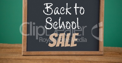 back to school sale text on blackboard