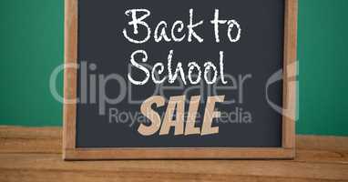 back to school sale text on blackboard