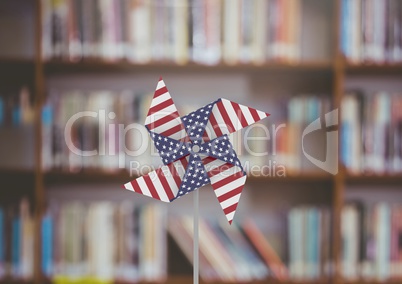USA wind catcher in front of bookshelf