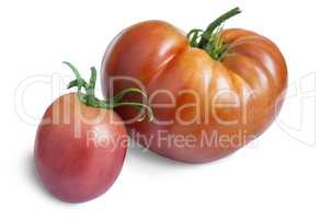 Two ripe tomatoes on a white background.