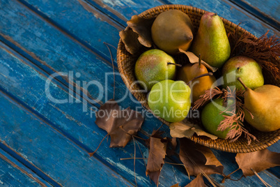 High angle view of pears in wicker basket