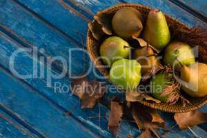 High angle view of pears in wicker basket