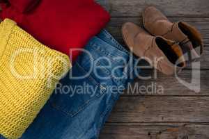 Directly above shot of warm clothing with jeans and shoes