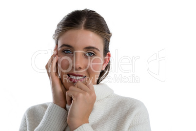 Portrait of smiling young woman wearing sweater