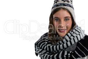 Portrait of smiling young woman with scarf