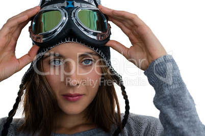 Close up portrait of woman wearing ski goggles