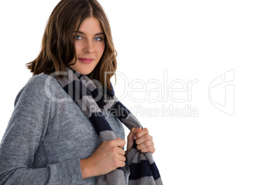 Portrait of young woman wearing scarf