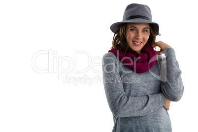 Portrait of confident young woman wearing warm clothing