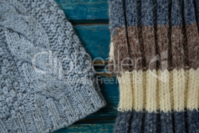 Close up of knit hand and scarf