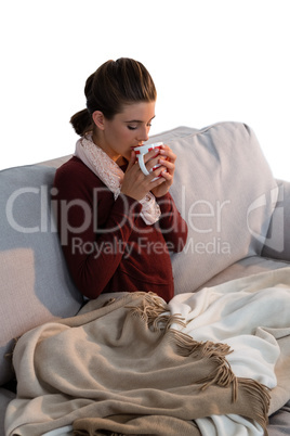 High angle view of woman drinking coffee