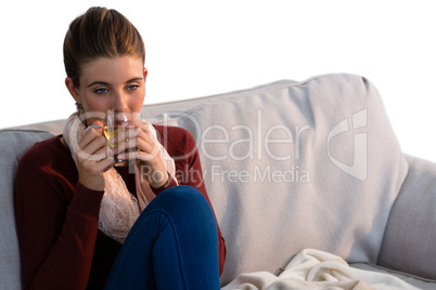 Young woman having lemon tea