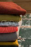 Close up of colorful stack of sweaters
