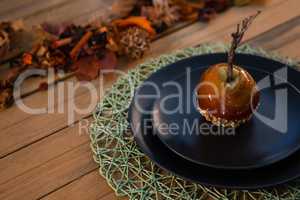 High angle view of caramelized apple served in plate