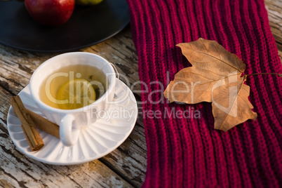 High angle view of green tea by sweater