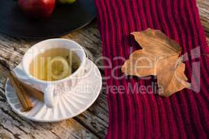 High angle view of green tea by sweater
