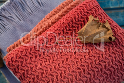 High angle view of dry leaf on sweater