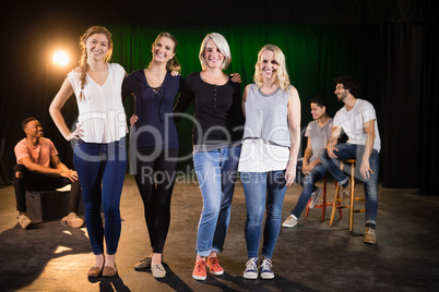 Actors practicing play on stage