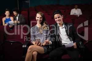 Couple watching movie in theatre