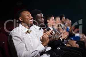 Group of people applauding