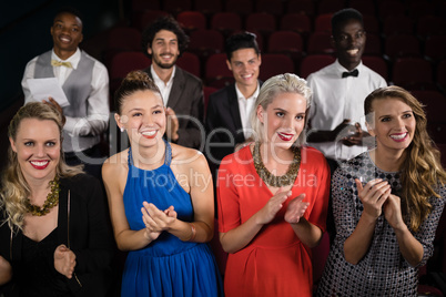 Group of people applauding