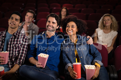 Couple watching movie in theatre Couple watching movie in theatre