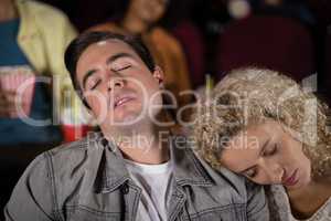 Couple sleeping in theatre