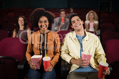 Couple watching movie in theatre