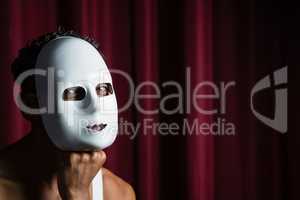 Artist wearing white mask on his face