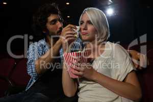 Couple getting emotional while watching movie