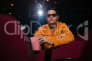 Man in 3d glasses watching movie