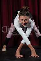 Ballerina performing stretching exercise