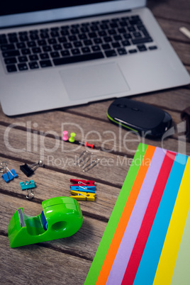 Close up of laptop and digital tablet with office supplies