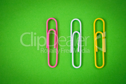 Close up of paper clips on paper