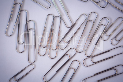 Directly above shot of metallic paper clips